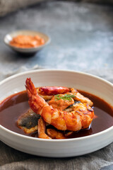 Bouillabaiss, French fish soup with sea bass and prawns