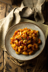 Pasta with tomato sauce and salami