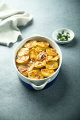 Traditional homemade potato gratin with cheese