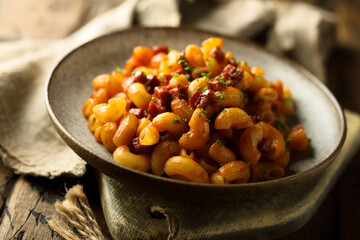 Pasta with tomato sauce and salami