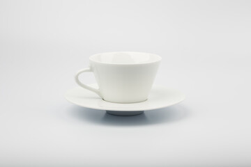 White ceramic coffee cup on white background