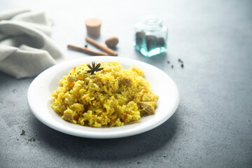 Delicious rice with spices in a bowl