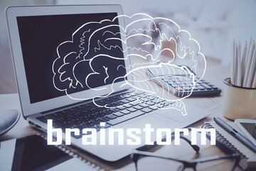 Desktop computer background in office and start up theme hologram drawing. Double exposure. Startup concept.