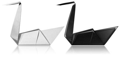 One black and one white paper swan, origami isolated on white background with reflections,...