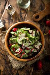Healthy vitamin salad with radish and cucumber