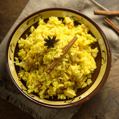 Delicious rice with spices in a bowl