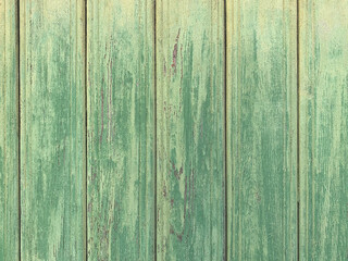 Fototapeta na wymiar Background from old cracked wooden boards. Light green color, top view. Place for your design, lettering composition.