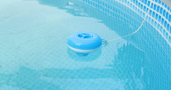 Worker hands isinfection and chlorination of water in the pool. Purification from pollution pool chlor dispenser.