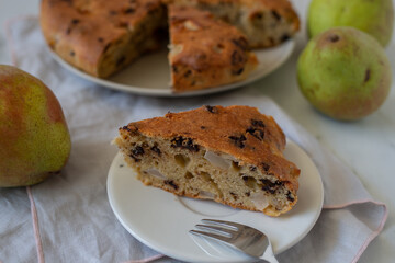 home made vanilla cake with chocolate chips and pears