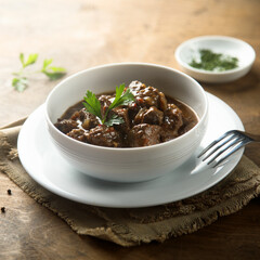 Traditional homemade beef ragout with fresh parsley