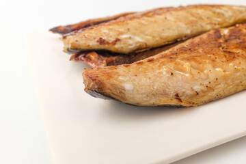 Grilled mackerel on white background
