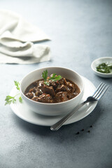 Traditional homemade beef ragout with fresh parsley