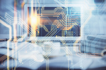Double exposure of desktop with computer and world map hologram. International data network concept.