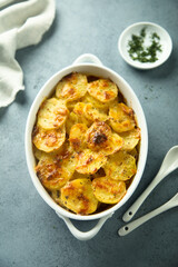 Traditional homemade potato gratin with cheese