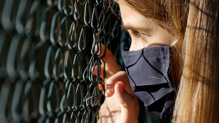 Sad Child Wears Protective Mask due Coronavirus Pandemic, Sick Unhappy Girl, Depressed Kid not...