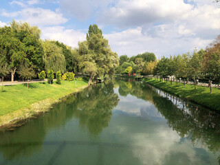 Reflection through Porsuk stream, Eskisehir in a cloudy day with a street lamp. September/2018