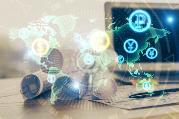 Financial chart drawing and table with computer on background. Multi exposure. Concept of international markets.