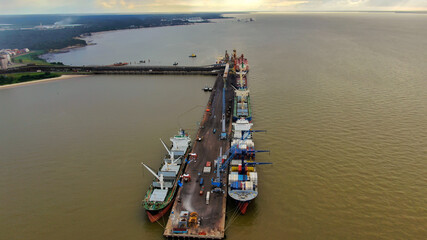 View of cargo port Vila de Conde in north Brazil with bulk and container vessels alongside