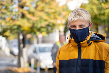 Teenager in a protective mask