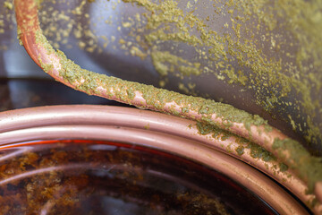 Close-up of a copper immersion heat exchanger which is used in the craft beer process. Selective...