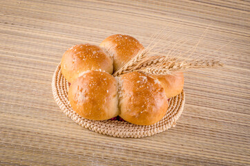 Bun with wheat spike - bakery food photo