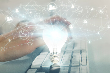 Growing arrows with businessman working on computer on background. Success concept. Double exposure.