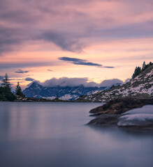 sunset over the lake in the austrian alps at the dachstein region in styria, austria with a beautiful view of the alps 