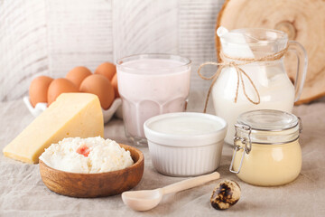 A variety of dairy products, cheese, farm eggs. The concept of the farmer's market. Copy space.