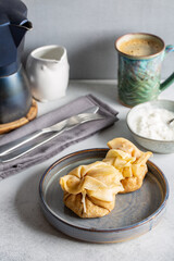 Tasty breakfast with  pancakes and coffee.