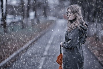 seasonal autumn portrait, sad girl with umbrella, november seasonal virus immunity on a walk