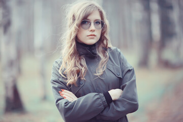 girl glasses autumn portrait, an adult woman glamorous autumn look