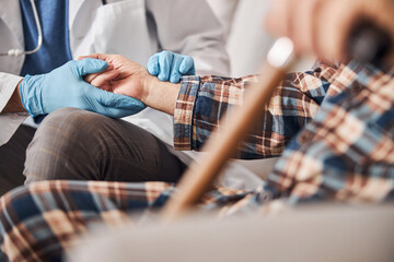 Fototapeta premium Healthcare professional conducting the patient medical examination