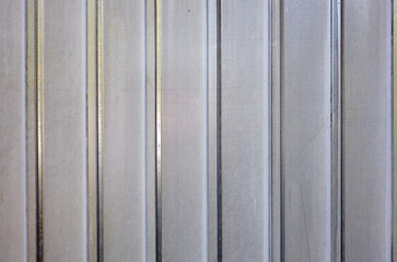 White corrugated metal or zinc texture surface or galvanize steel in the vertical line background. Close-up of zinc wall background