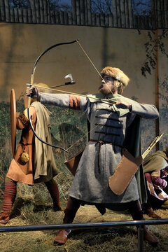Medieval knight  fight with wooden bow and arrows,The Carpathian Troy Open-Air Museum in Trzcinica, podkarpackie, Poland