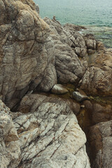 Rock and the sea, the rocky coastline, the Bay Telyakovsky Primorsky Krai, Russia.