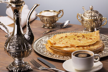 very tasty and healthy for breakfast hot pancakes with aromatic black coffee