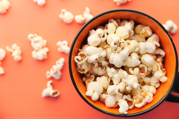  popcorn in a bowl on orange background top view 