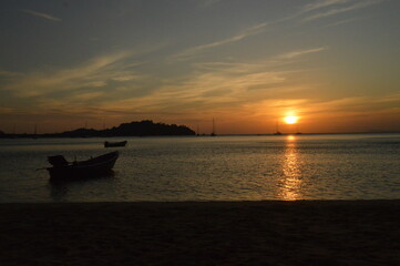 Sunset over the beaches on the untouced paradise island of Ko Phayam in the Andaman Sea, Thailand