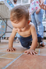 photograph of a crawling baby