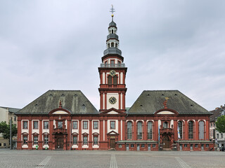 Mannheim, Germany. Double building of the Old Town Hall (left) and the parish church of St. Sebastian (right) with bell tower. The building ensemble was built at the beginning of the 18th century.