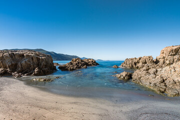 Fototapeta na wymiar Small sandy beach at Ostriconi in Corsica