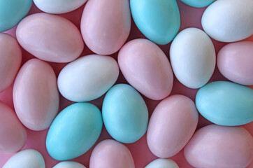 Almond candies close up view, sweets background
