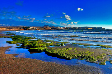 El Medano, rocks and puddles at low tide