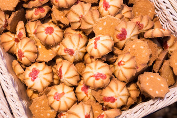 crispy cookies in wicker baskets on the counter