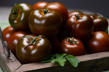 Fresh ripe sweet reddish brown and green kumato tomatoes