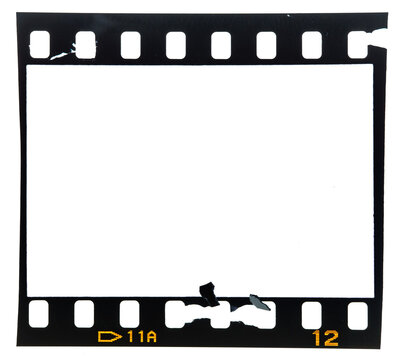 single film frame, real macro photo of damaged 35mm filmstrip on white.