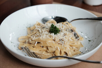 Fresh fettuccine pasta with parsley