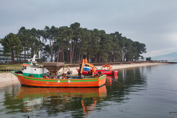 Fototapeta na wymiar Anchored mussel aquaculture boats