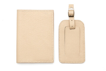 Leather covers for passport, handcrafted work. Brown, white, yellow, beige colors on a white background