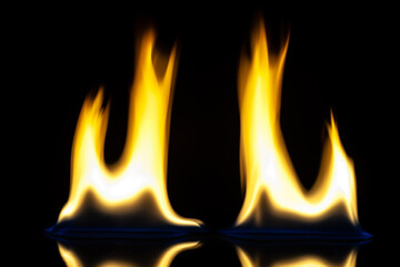 The fire. Flames are burning isolated on a black background.